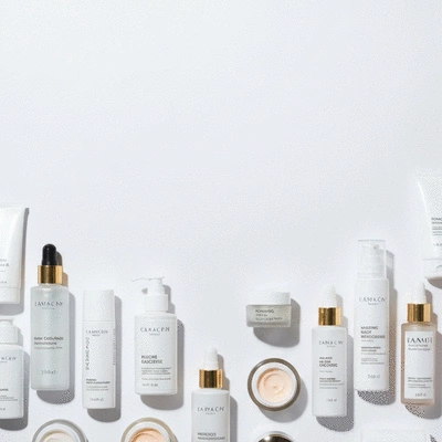Close-up of various skincare product bottles and jars on a clean, minimalist background, illustrating product diversity and choice, no text, no words, no typography, clean image