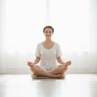 Person meditating in a serene environment, symbolizing stress reduction and mental clarity